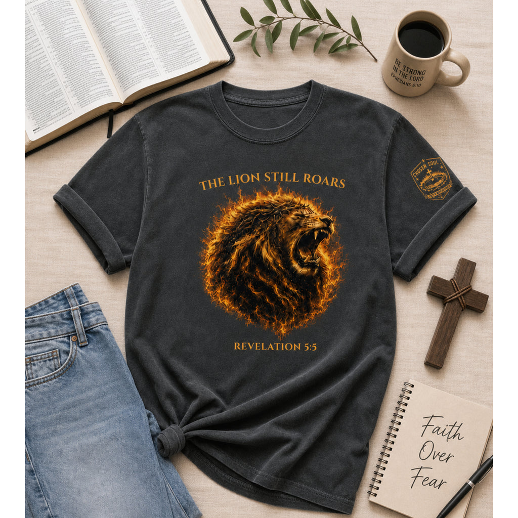 Man wearing a red The Lion Still Roars Revelation 5:5 Christian T-shirt in an urban setting