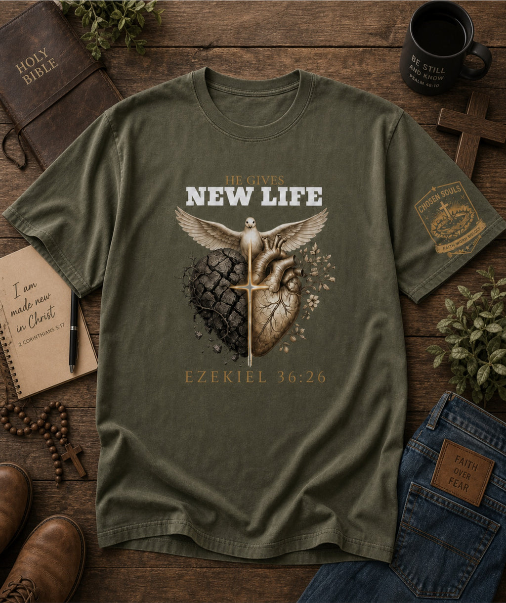 He Gives New Life Ezekiel 36:26 Comfort Colors 1717 Moss Christian t-shirt flat lay