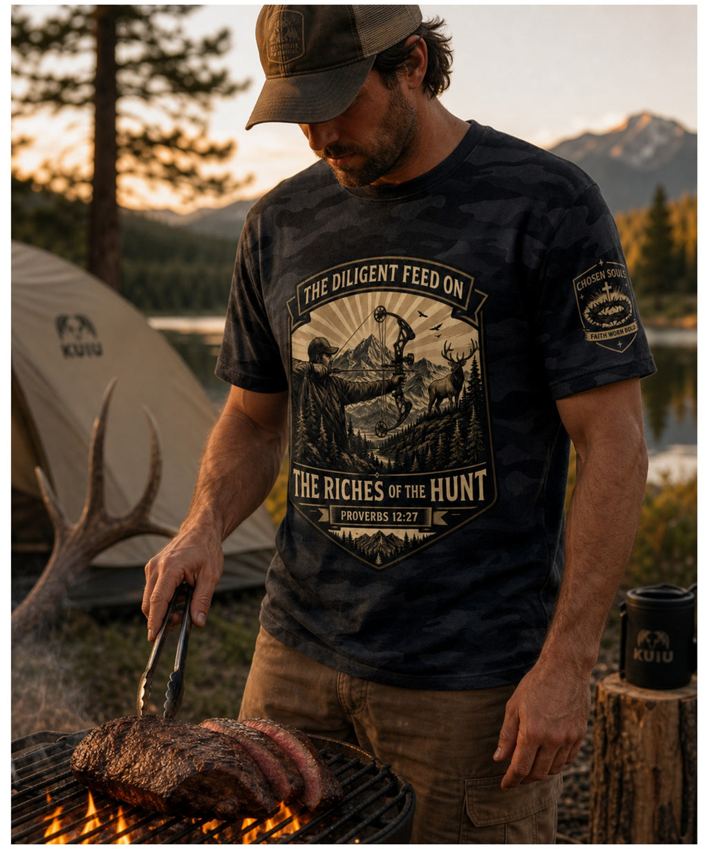 Man wearing The Riches of the Hunt Proverbs 12:27 Black Camo Christian bowhunting t-shirt outdoors